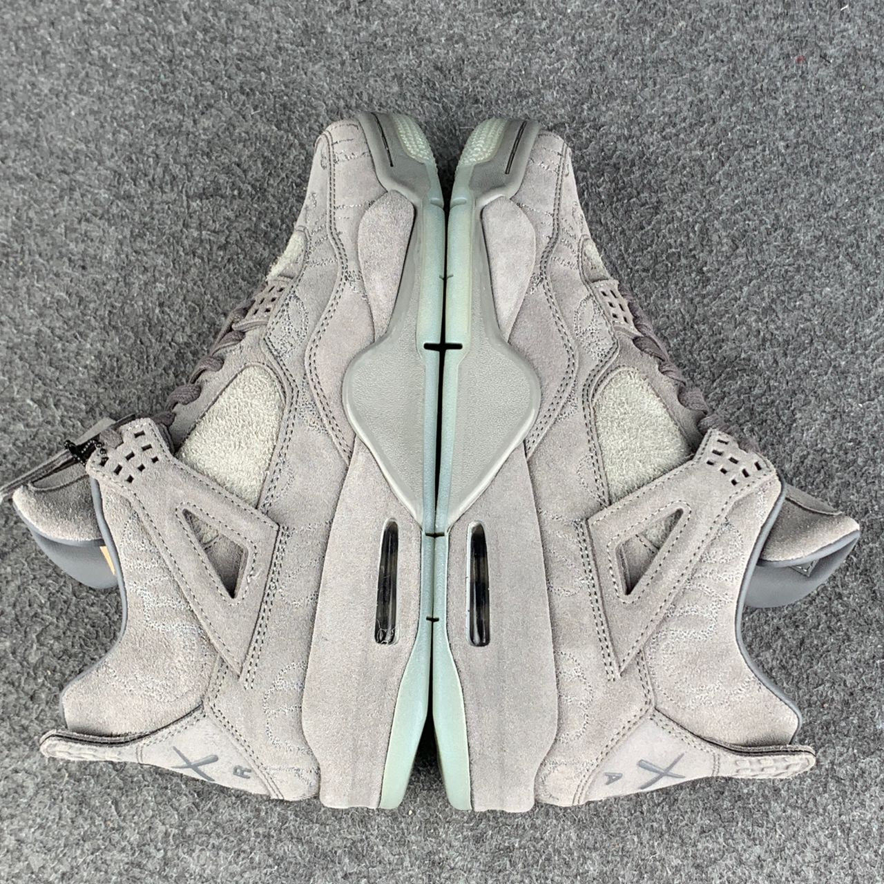 KAWS x Air Jordan 4 Retro 'Cool Grey' Sample